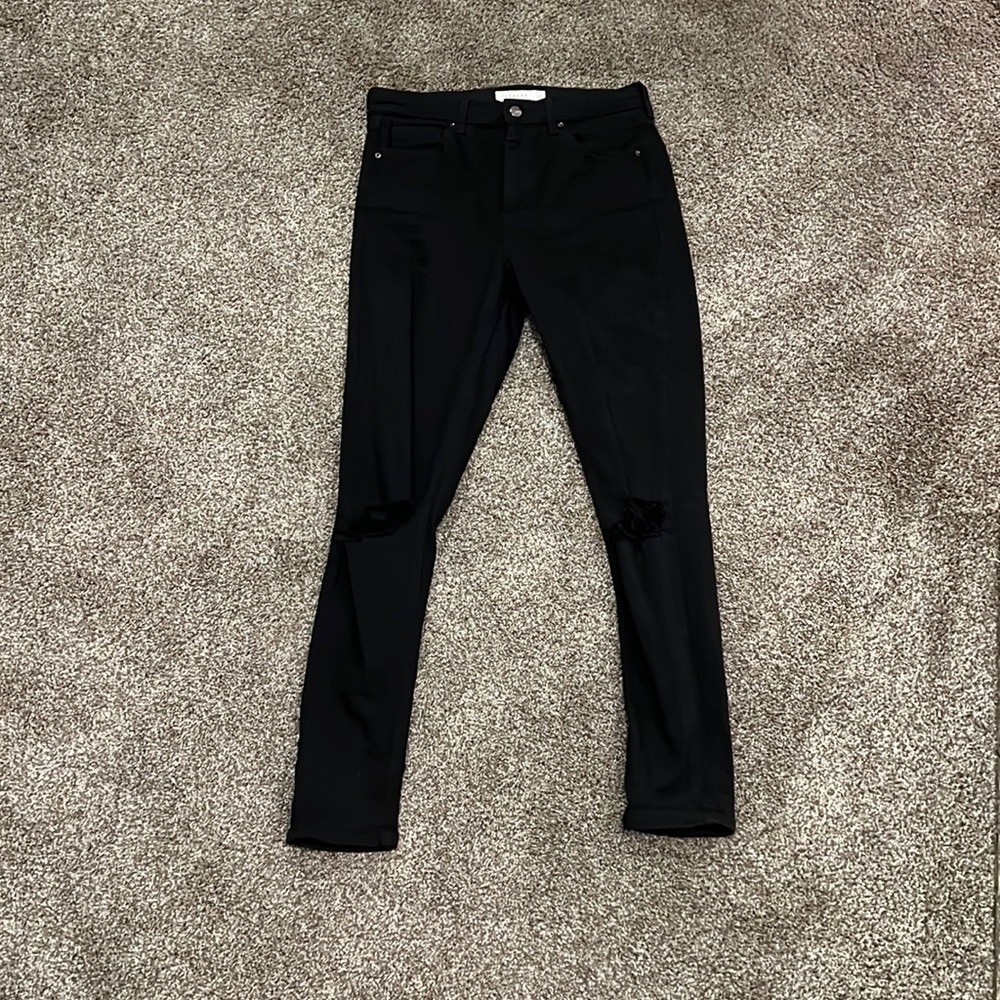 Topshop Jamie black skinny jeans with holes at the knees. W30 L32. Pockets